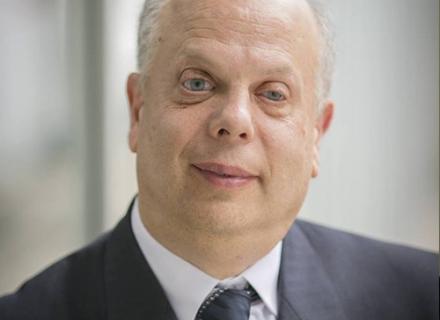 David Lepofsky. A balding man wearing a blue suit.